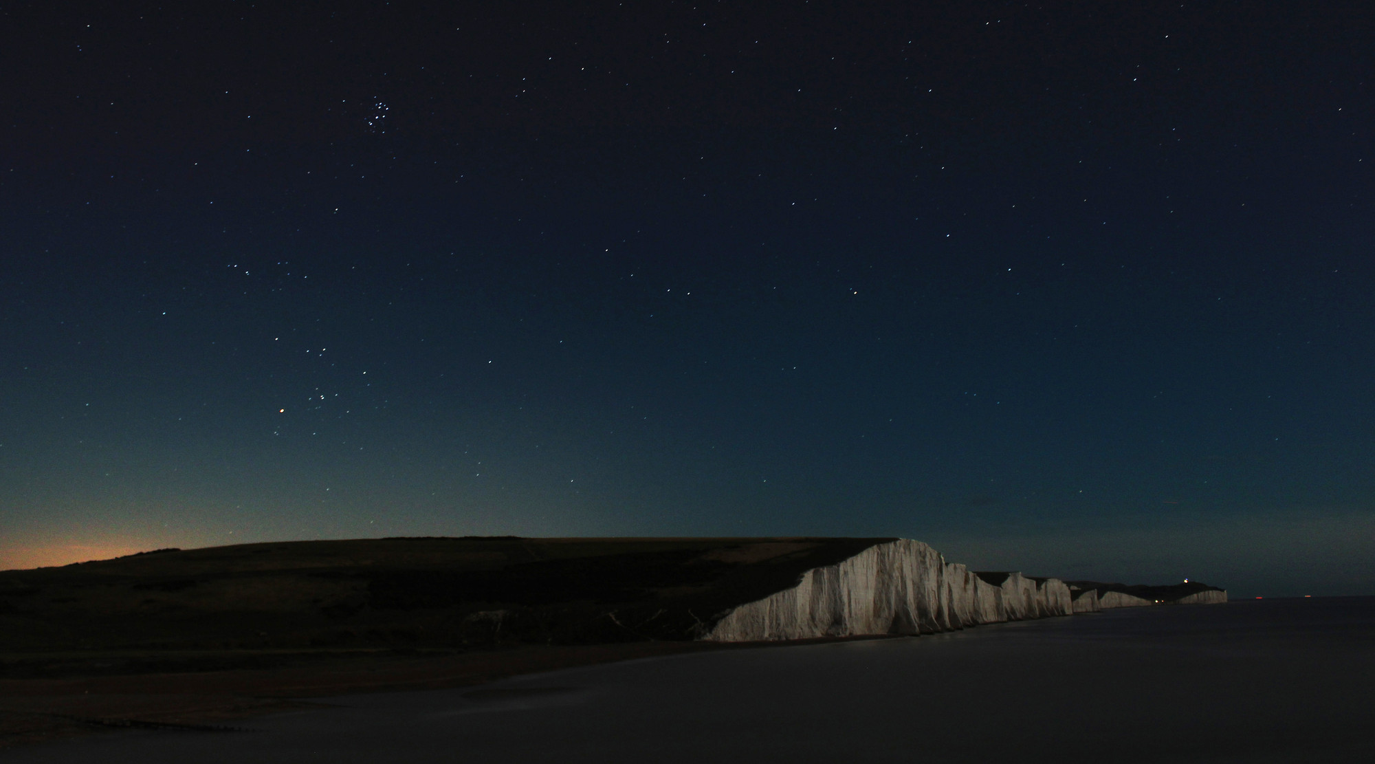 A starry sky above the cliffs at Seven Sisters