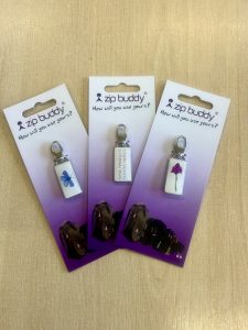 image shows three examples of zip buddies an easy to attach fun item that looks great on jackets or fleeces, rucksacks or camera cases etc.