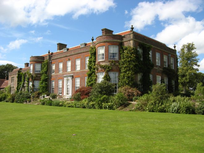 Hinton Ampner - a Georgian brick building with immaculate lawns and flowers