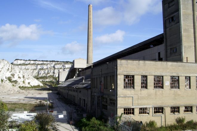 Picture of Shoreham Cement Works with chalk cliffs in background