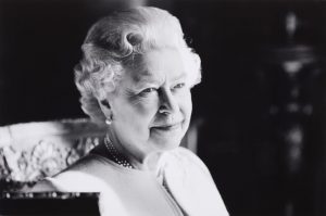 A black and white portrait of Queen Elizabeth II