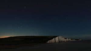 A starry sky above the cliffs at Seven Sisters